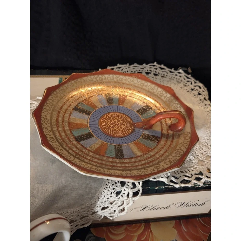 vintage Japanese porcelain handled dish, commonly known as a 